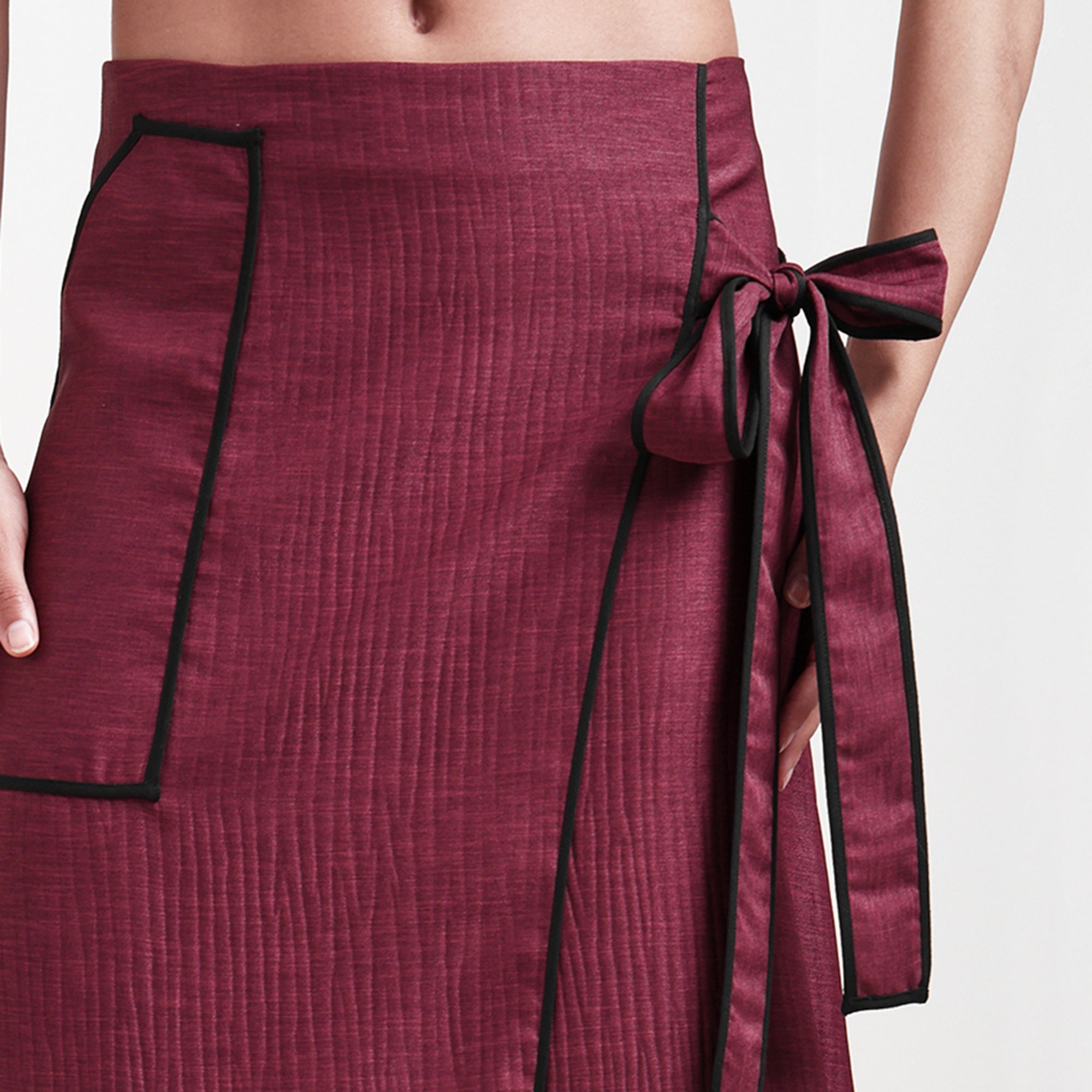 Wine Asymmetrical Textured Skirt With Black Piping