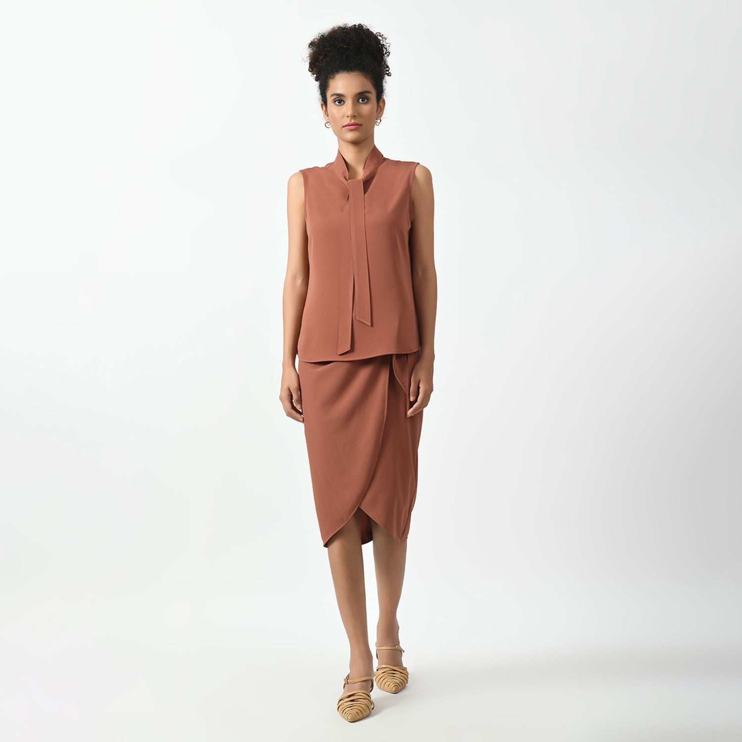 Peach Sleeveless Top With Knot, sleveeless tops for women, top with knot, peach colour tops, office wear tops, stylish formal tops, best tops for work, elegant worktops, trendy tops for women , modern tops for office, formal tops for women, tops for women stylish