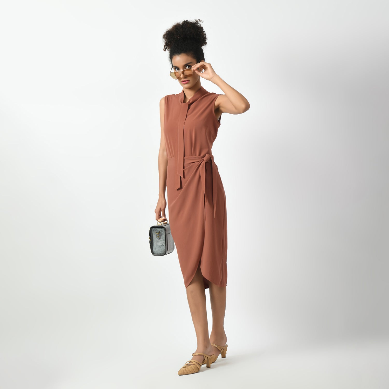 เสื้อแขนกุดสีพีชผูกโบว์