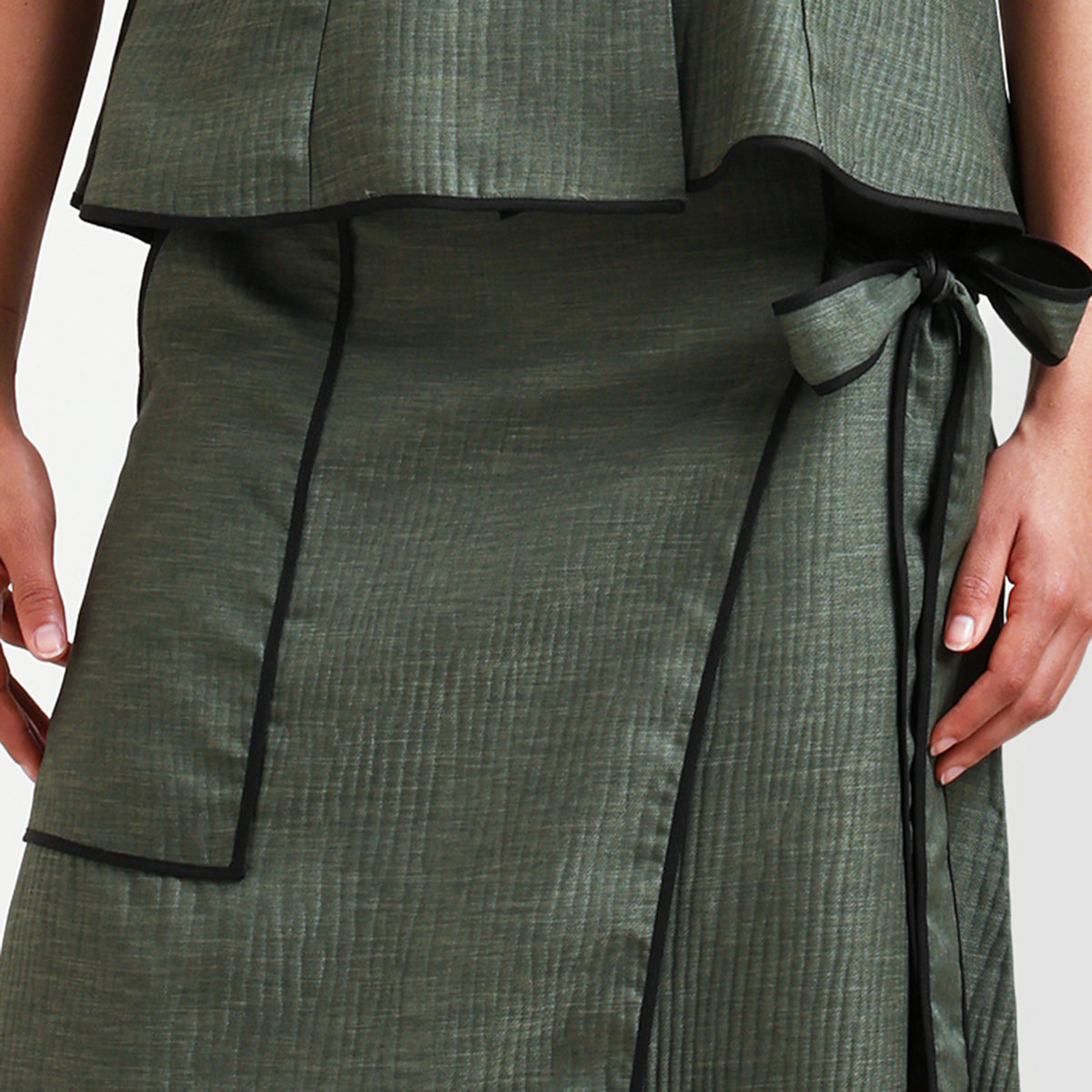 Olive Green Asymmetrical Textured Skirt With Black Piping