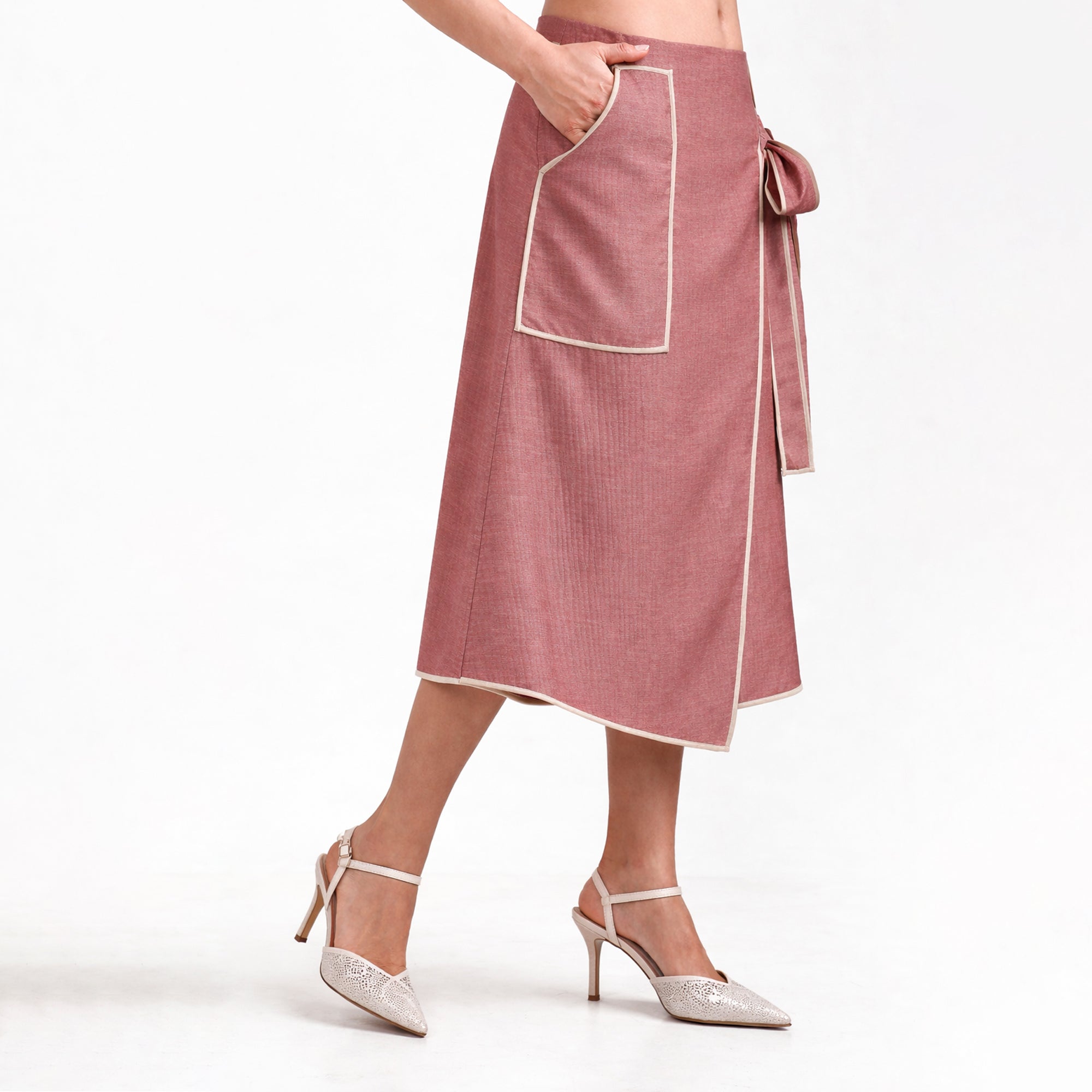Peach Asymmetrical Textured Skirt With Off Beige Piping