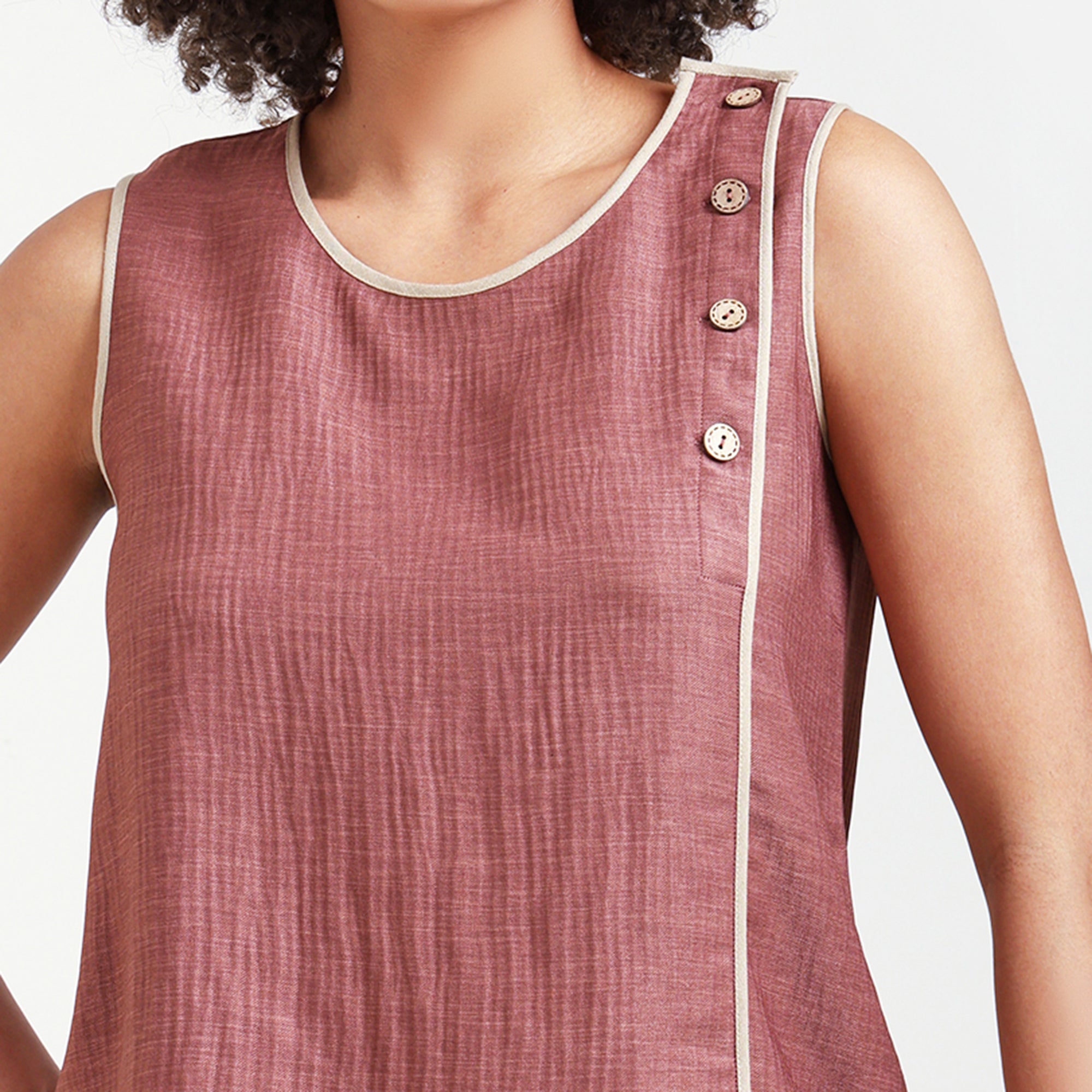 Peach Textured Sleeveless Top With Beige Piping