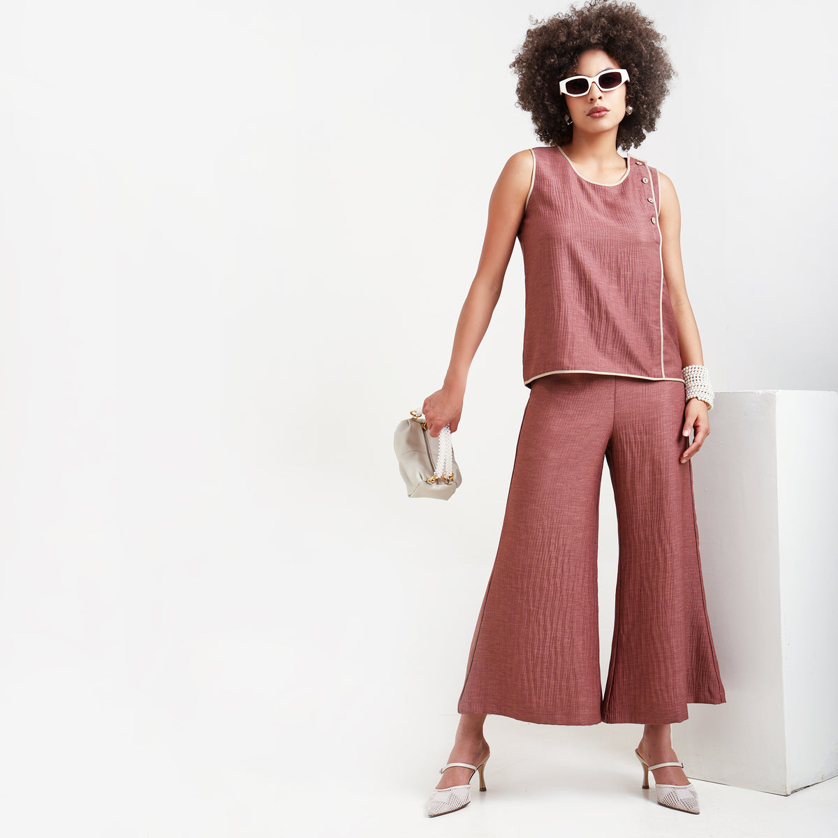 Peach Textured Sleeveless Top With Beige Piping