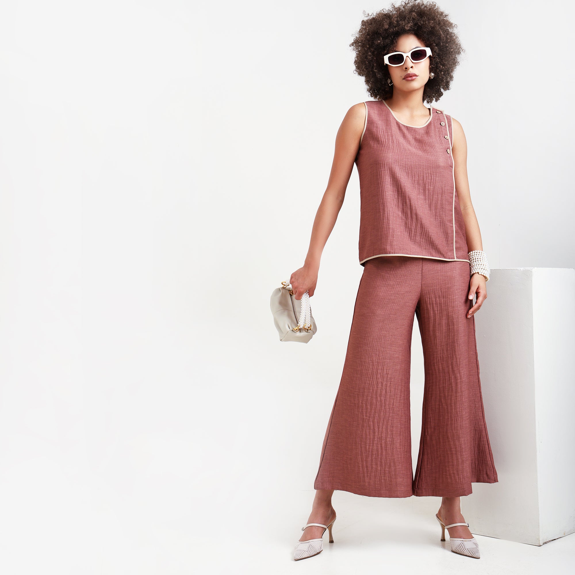 Peach Textured Sleeveless Top With Beige Piping