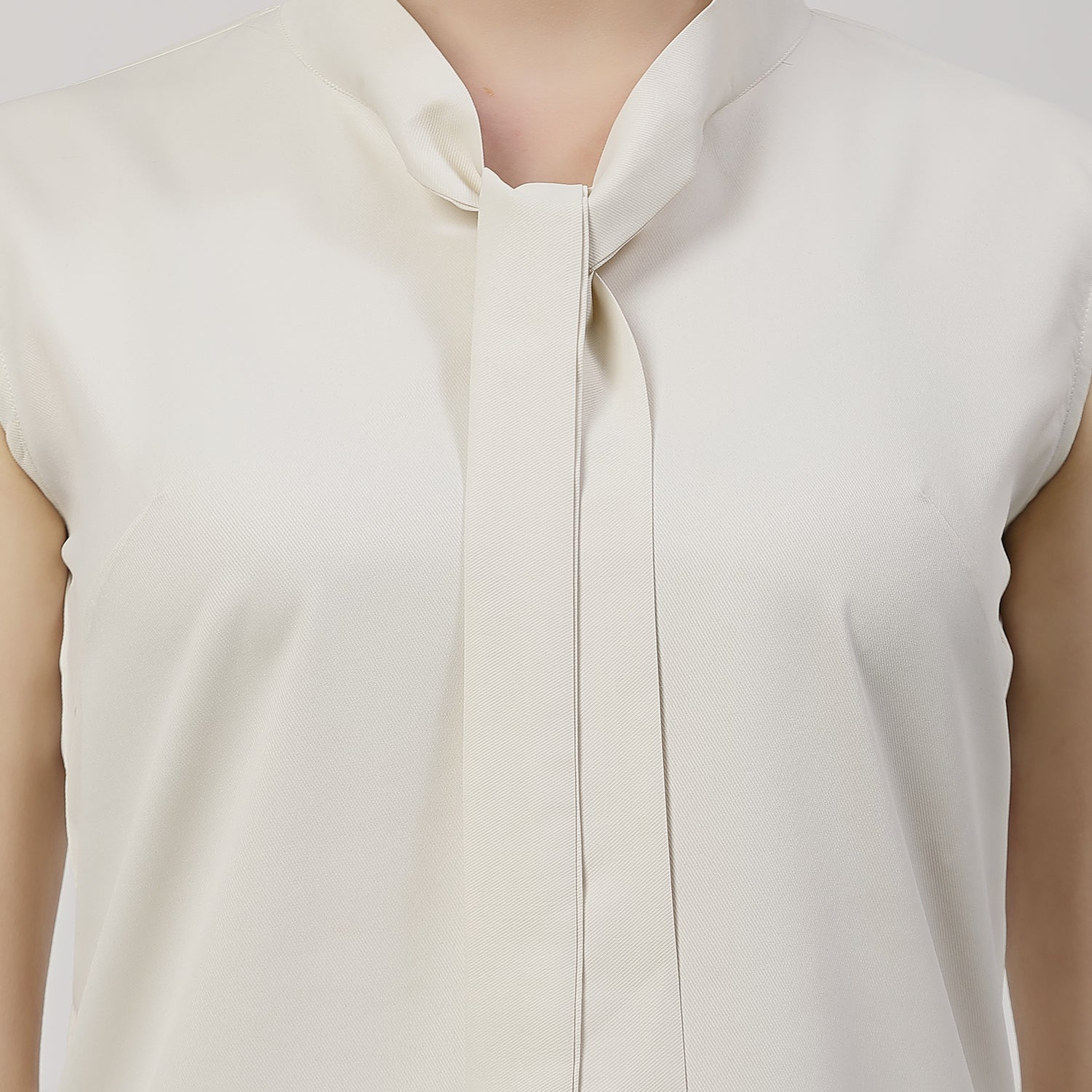 Cream Sleeveless Top With Tie Knot