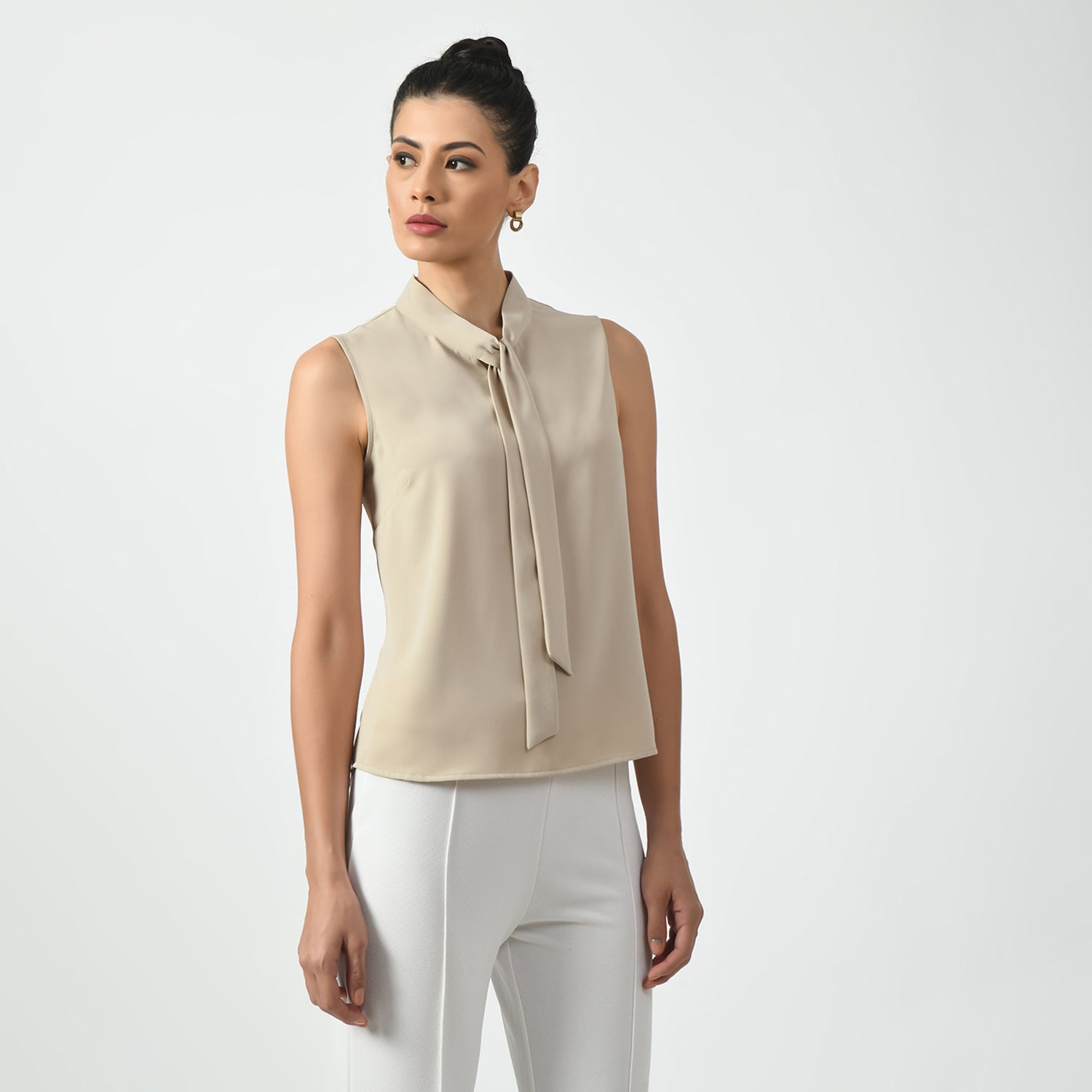 Light Beige Sleeveless Top With Knot, office wear tops , stylish formal tops , best tops for work, stylish work tops , trendy tops for women ,modern tops for office, formal tops for women, tops for women stylish, top with knots, sleveless top