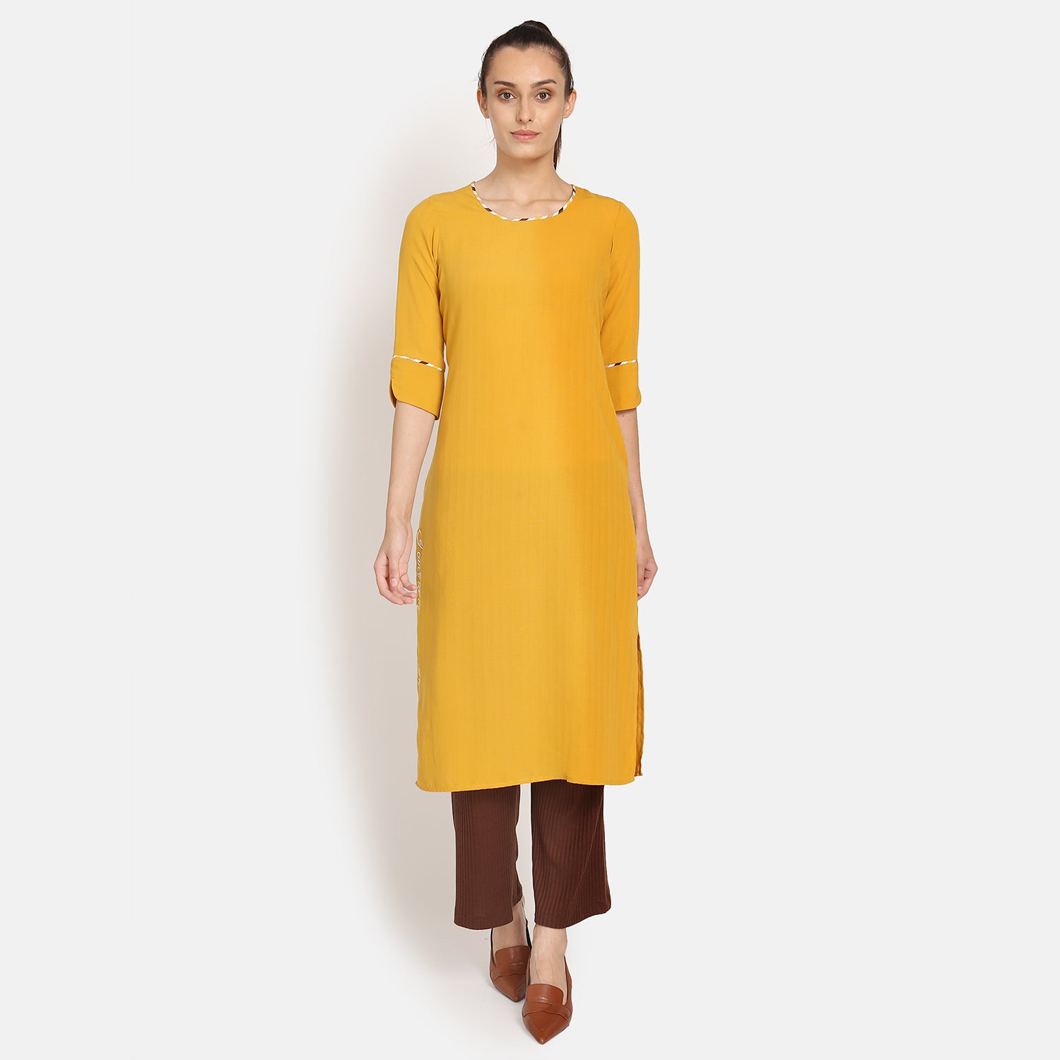 Yellow round neck kurta with embroidered slit