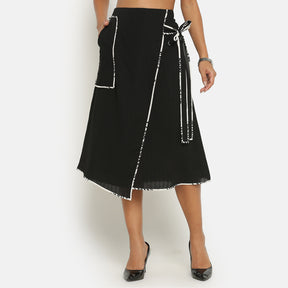 Black asymmetrical skirt with contrast piping