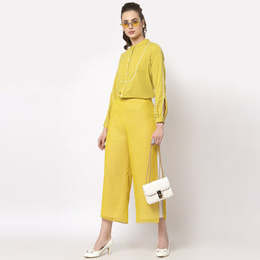 Yellow top with white piping
