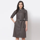 Grey dress with belt and white piping