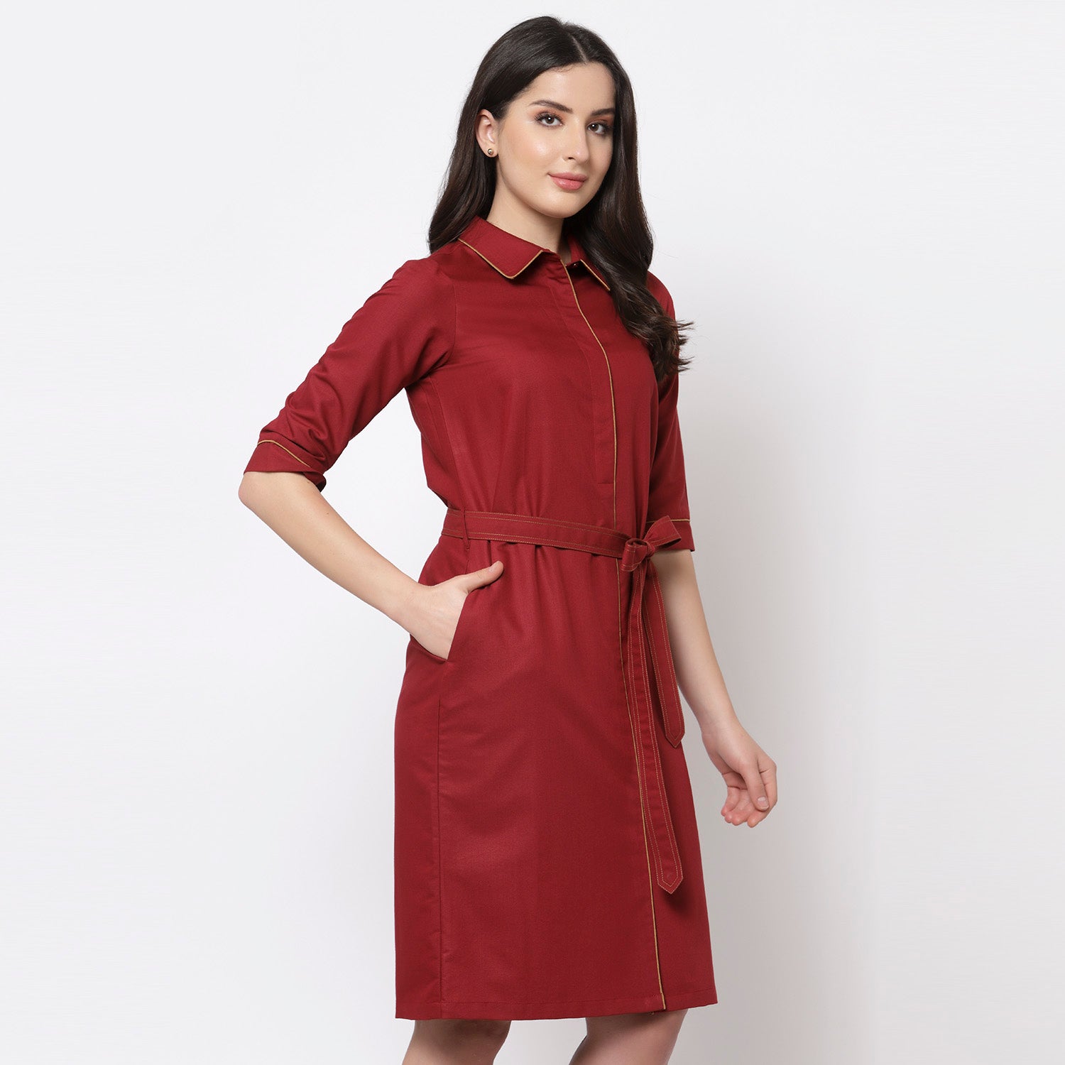 Red dress with belt and brown piping