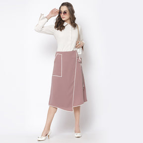 Pink assymetrical skirt with off white piping