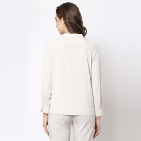 Off white top with frill collar