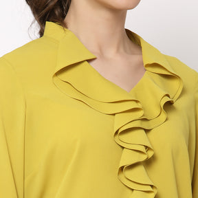 Yellow top with frill collar