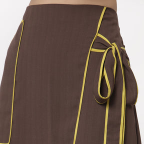 Brown assymetrical skirt with yellow piping